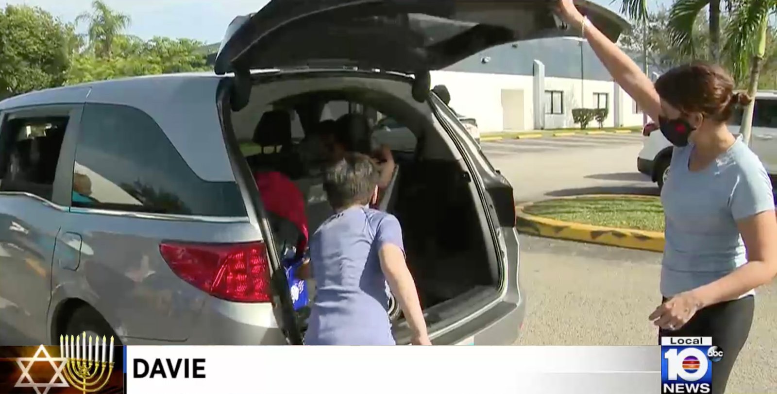 Drive through toy distribution in Davie
