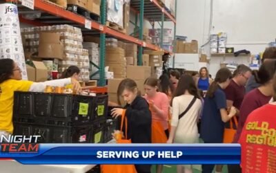 Volunteers help local churches and organizations at meal distributions held days before Thanksgiving